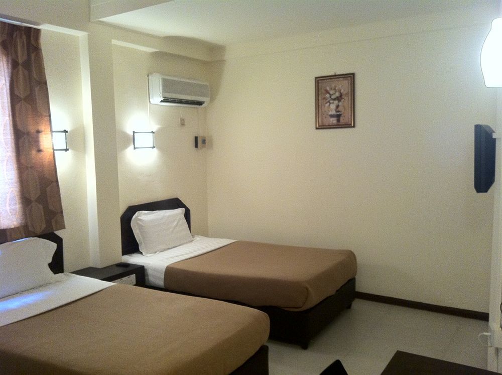 City Inn Кучинг Экстерьер фото